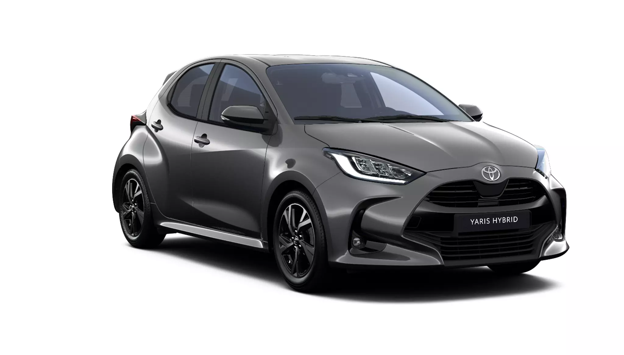 Ein schwarz Toyota Yaris in diagonaler Frontansicht vor einem weißen Hintergrund