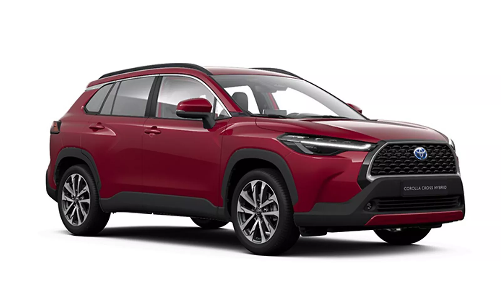 Ein weißer Corolla Cross Teamplayer Hybrid in diagonaler Frontansicht vor einem weißen Hintergrund